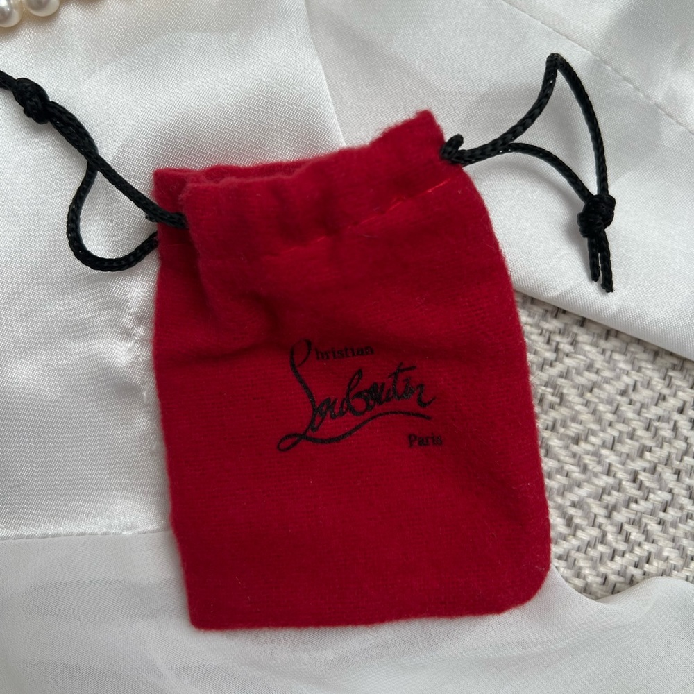 Tiny Christian Louboutin duster